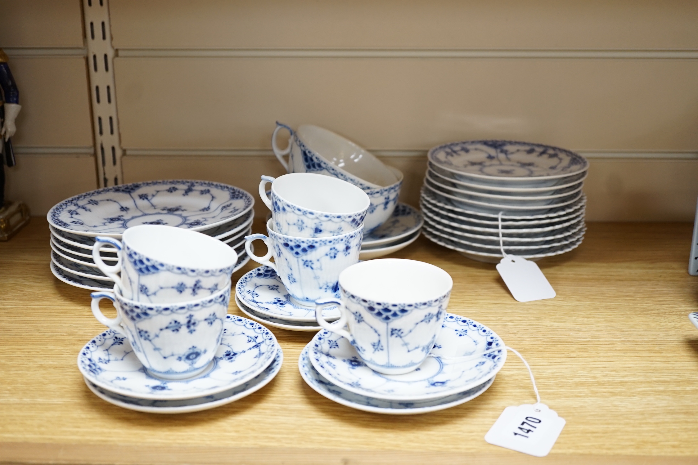A Royal Copenhagen blue and white ‘onion pattern’ coffee and part set comprising; seven coffee cups with eight saucers, two teacup and saucers, and six tea plates together with a set of six similar Bavaria tea plates